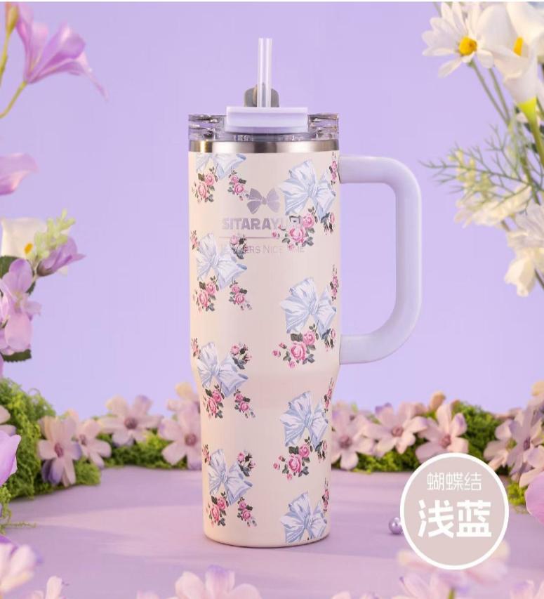 SITARAYURI "Flowers Nice Time" insulated stainless steel tumbler in a purple finish with a decorative bow and floral pattern | 900Ml