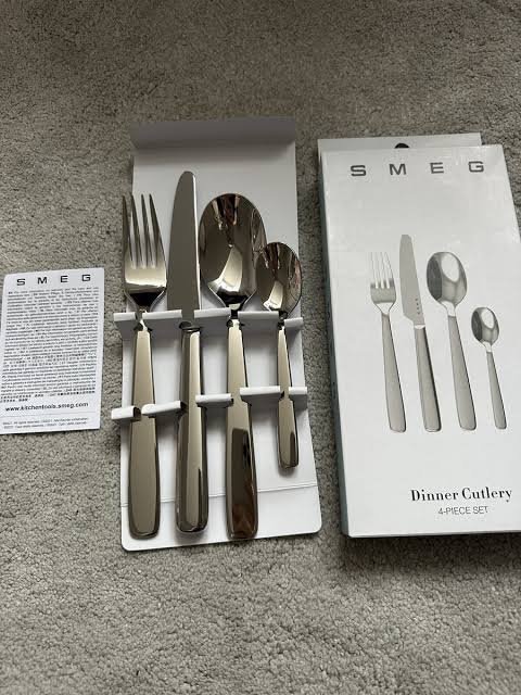 SMEG Stainless Steel 4-Piece Dinner Cutlery Set with a high-polish mirror finish