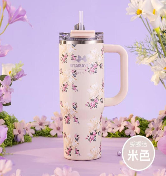 SITARAYURI "Flowers Nice Time" insulated stainless steel tumbler in a purple finish with a decorative bow and floral pattern | 900Ml