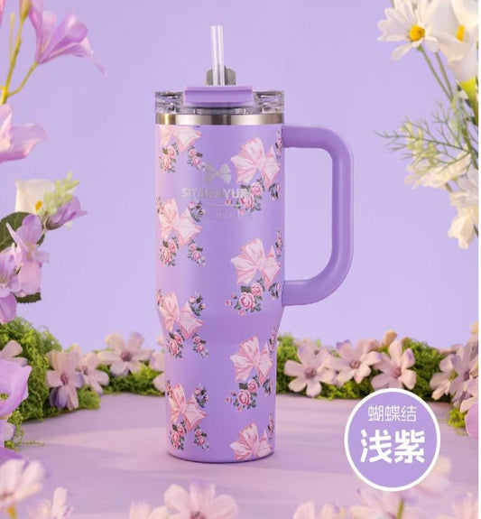 SITARAYURI "Flowers Nice Time" insulated stainless steel tumbler in a purple finish with a decorative bow and floral pattern | 900Ml