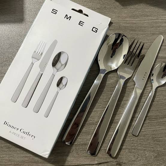 SMEG Stainless Steel 4-Piece Dinner Cutlery Set with a high-polish mirror finish
